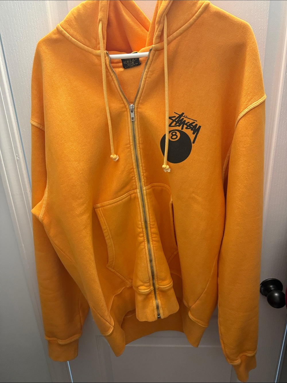 Stussy Orange Zip-Up Hoodie with Black Logo